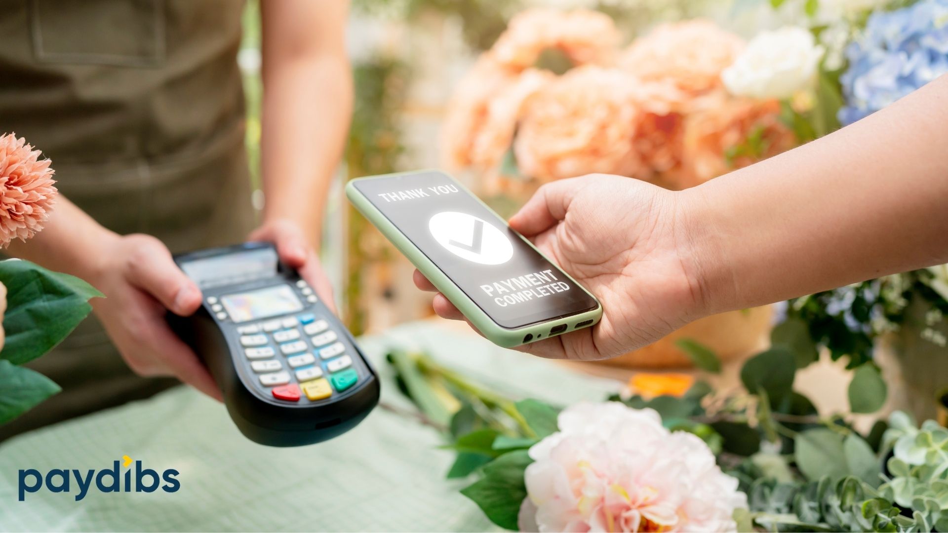 People using mobile phone to make payment successfully on payment terminal machine