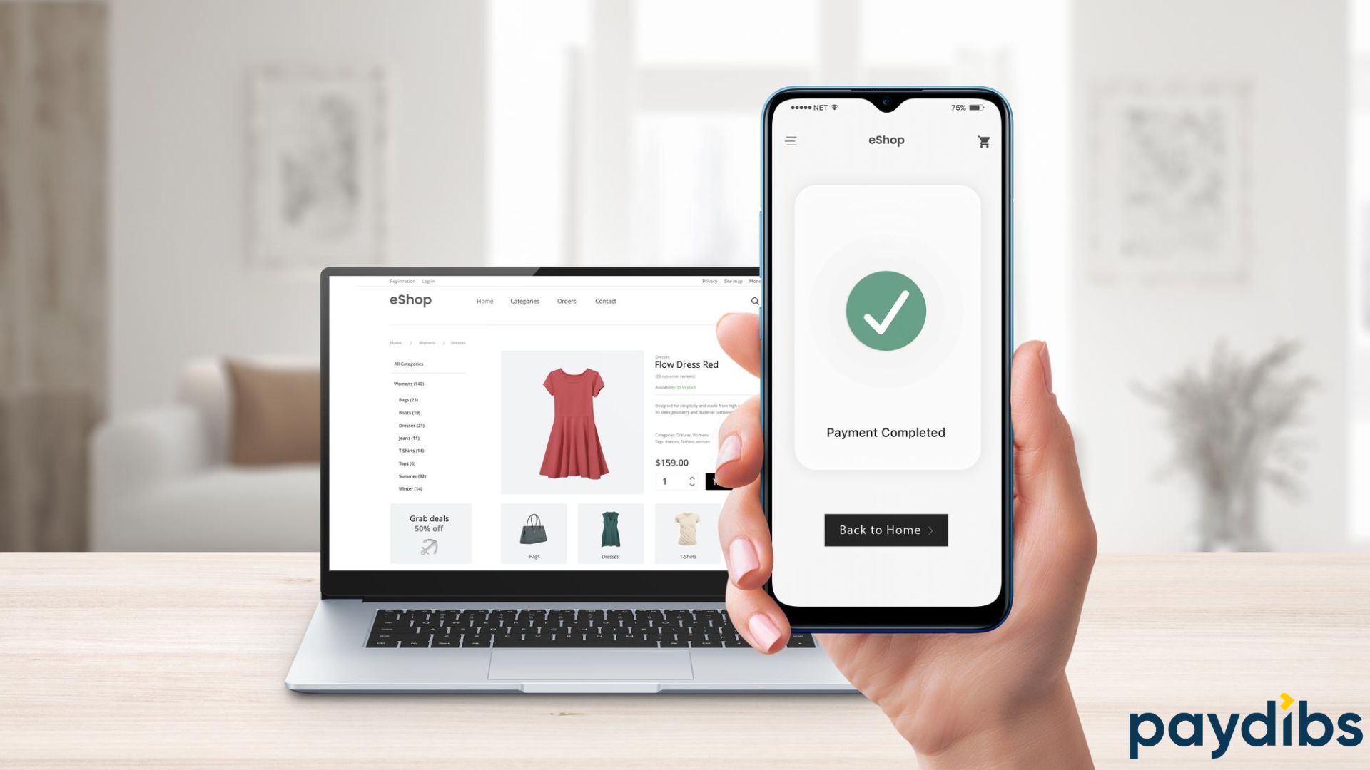 A hand holding payment completed to a online store platform