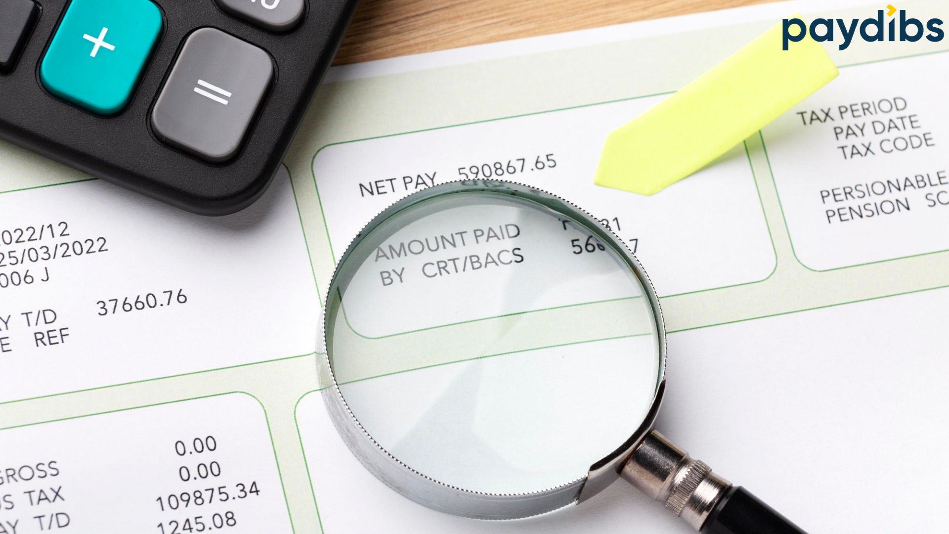 A magnifier place on tax file looking for TIN Number and calculator aside