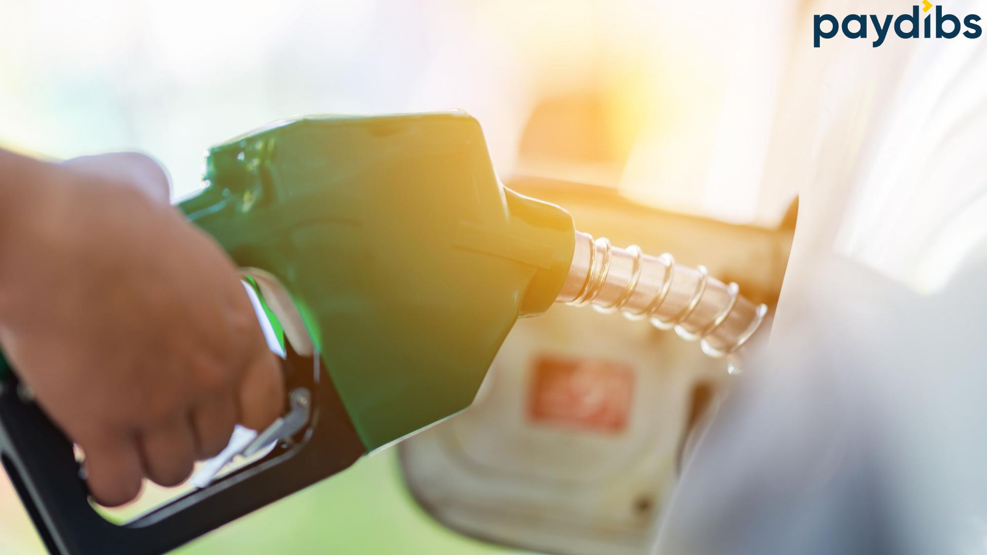 People filing RON95 fuel into vehicle after checking fuel price Malaysia.